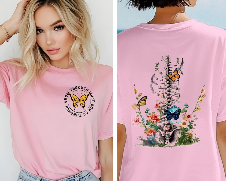May include: Pink t-shirt with a butterfly graphic and the text "Grow through what you go through". The back of the shirt features a floral design with a butterfly and a skeletal spine.