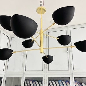 Lampadario Sputnik Mid-Century Modern: lampada a sospensione a 8 luci in ottone lucido e nero opaco