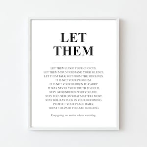 Pode incluir: Uma impressão emoldurada branca com texto preto. As palavras "LET THEM" estão no topo, seguidas por uma lista de frases motivacionais. A impressão incentiva a autoconfiança e a resiliência, com frases como "Proteja sua paz diariamente."