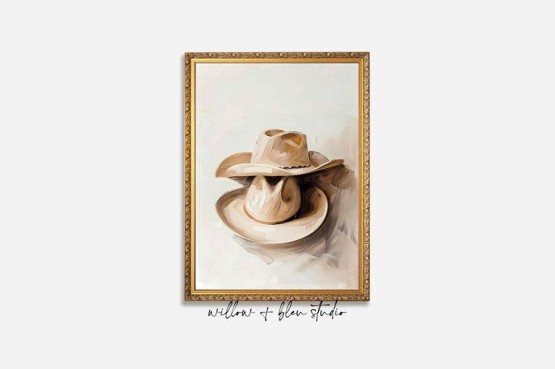 Rustic printable wall art featuring two cowboy hats in soft warm beige and brown tones — perfect for farmhouse, western, or cabin-inspired décor.