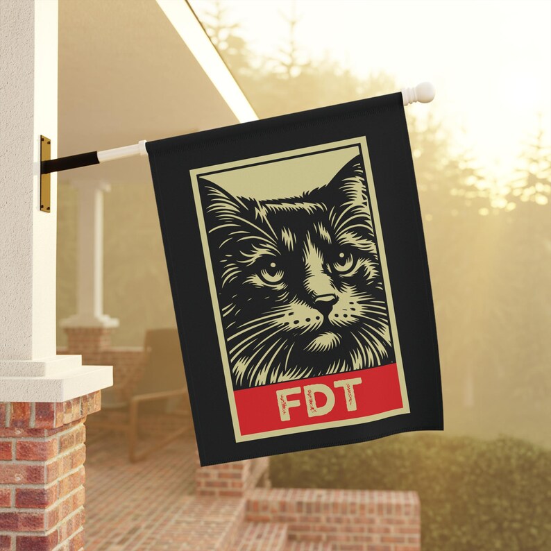 May include: A black flag with a white cat illustration and the text "FDT" in red.