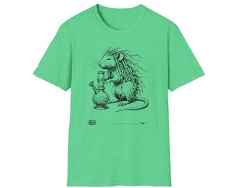 May include: A green t-shirt with a black and white illustration of a rat smoking a bong. The rat has a long, bushy tail and is wearing a hat.