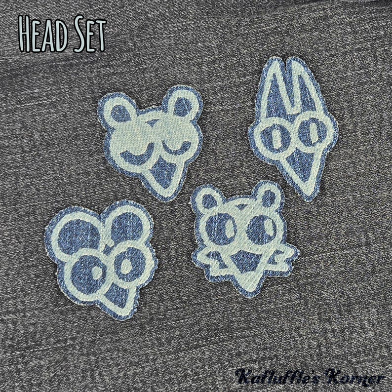 May include: Four embroidered patches featuring stylised cartoon character heads in light blue thread on a dark denim background. The text HEAD SET appears in the top left corner, and the text Kathuffle's Korner is in the bottom right corner.