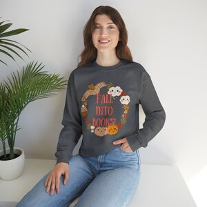 Sudadera con cuello redondo de libros de otoño