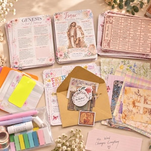 May include: A collection of Christian-themed stationery including Bible study cards with floral designs, a brown envelope containing stickers, a clear plastic pouch with colourful pens, washi tape, and sticky notes, plus a card with the text His Word Changes Everything.