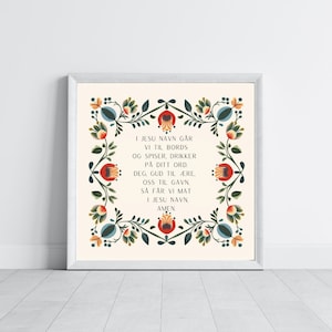 Könnte beinhalten: Ein gerahmter Druck mit weißem Hintergrund und einem bunten floralen Rahmen. Der Text im Rahmen lautet "I JESU NAVN GÅR VI TIL BORDS OG SPISER, DRIKKER PÅ DITT ORD. DEG, GUD TIL ÆRE, OSS TIL GAVN, SÅ FÅR VI MAT I JESU NAVN, AMEN."