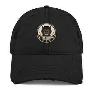 May include: Black distressed baseball cap featuring a circular patch with a wolf-like creature and the text "EXTRA ORDINEM". The patch has a gold border and stars. The cap has a pre-worn look.