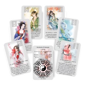 May include: A collection of oracle cards featuring watercolor illustrations of Asian figures in traditional attire. Each card has a unique design with text, including "The Book of Changes I Ching" and "Yin Yang" symbols. The cards are designed for divination.