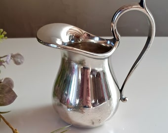 Creamer from the jeweler Ercuis, vintage French silver-plated milk jug