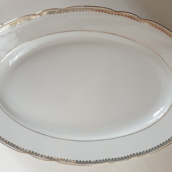 Grand plat porcelaine de Sologne avec dorure français vintage français