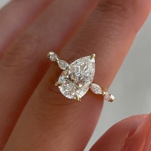 2CT Certified Pear Lab Grown Diamond Timeless And Elegant Hidden Halo Ring with Unique Marquise Cut Engagement Ring In Solid Gold For Women.