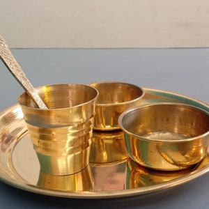 pooja thali plate for offering prayer and prasada to god