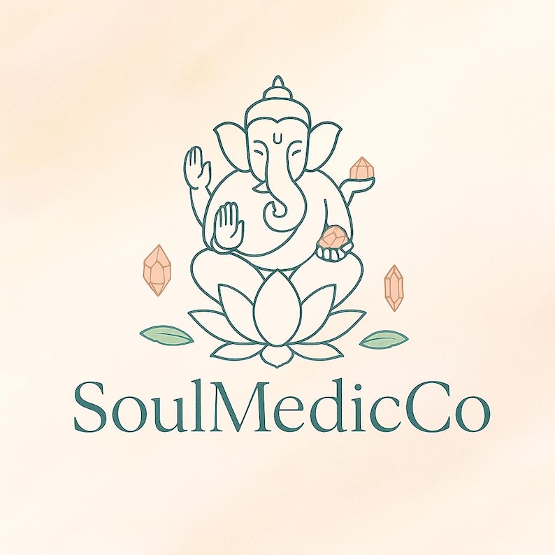 May include: A logo featuring a teal outline of the Hindu deity Ganesha seated on a lotus flower, holding crystals. The text "SoulMedicCo" is below the illustration in teal. The background is a soft, off-white color.