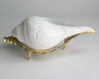 Bring the sacred energy of Ganga into your home with this elegant White Jal Shankh (water conch) on a brass stand — perfect for daily puja