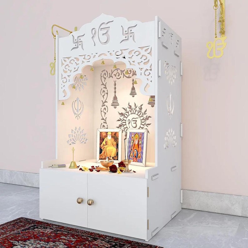On the lookout for a designer & compact mandir for home. Bring this handcrafted and intricately carved wooden temple to your home right away and make your puja room stand out in terms of decor.