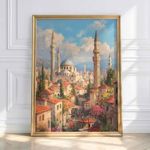 May include: A framed painting depicts a cityscape with a mosque, minarets, and buildings with red-tiled roofs. The artwork features a gold frame and a vibrant color palette of blues, greens, and reds, evoking a sense of historical architecture.