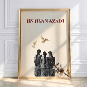May include: A framed art print with the text "JIN JIYAN AZADÎ" above three figures with long braids, viewed from the back. The artwork includes illustrations of doves and a sprig of flowers, set against a cream-colored background.