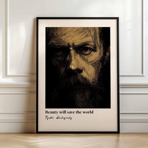 Könnte beinhalten: Ein gerahmter Kunstdruck mit einer detaillierten Skizze eines Männergesichts mit langem Bart. Das Kunstwerk ist in Gold- und Schwarztönen gehalten, mit dem Text "Beauty will save the world" und "Fyodor Dostojewski" darunter.