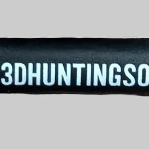 May include: A black cylindrical tool featuring a textured grip at both ends and a central shaft. The shaft displays a circular logo with a deer head silhouette and the white text 3DHUNTINGSOLUTIONS.COM printed along the side.
