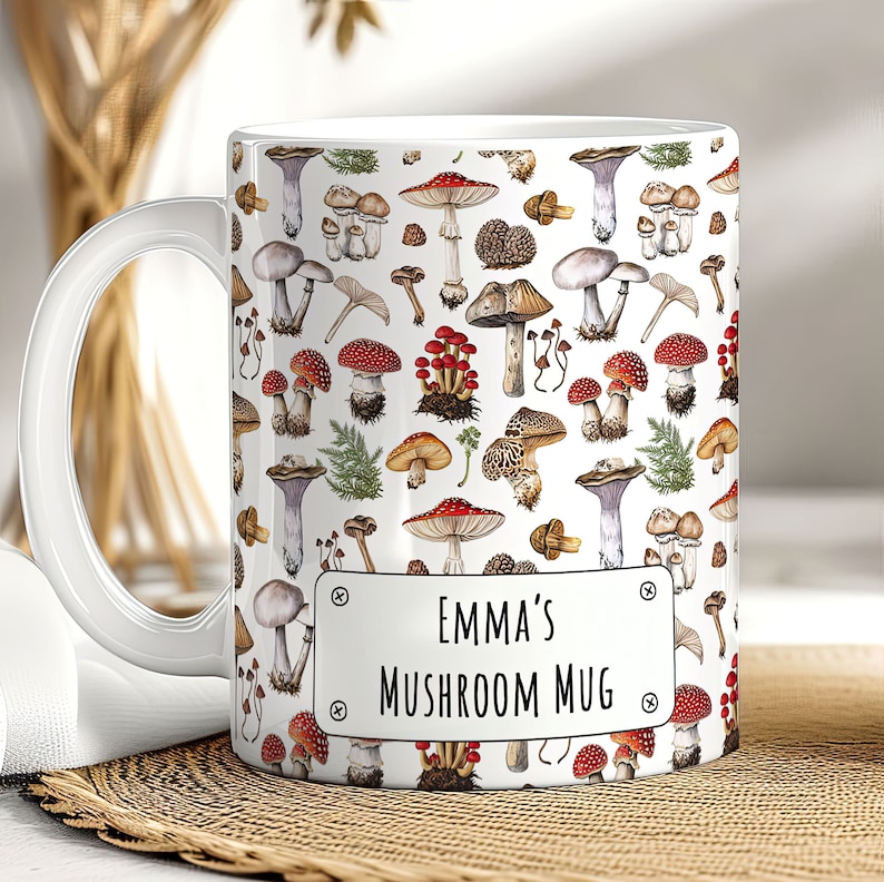 May include: White ceramic mug with a colorful mushroom pattern and the text "Emma's Mushroom Mug" on the front.