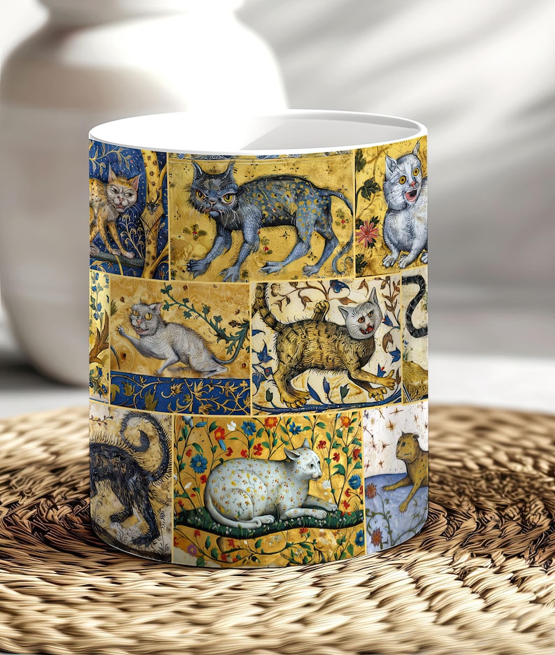May include: A white ceramic mug with a colorful pattern of cats in a medieval style. The cats are depicted in various poses and colors, with intricate floral designs surrounding them.