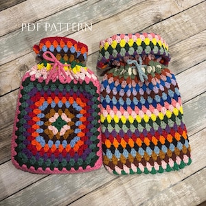 May include: Two colorful, crocheted hot water bottle covers. One features a granny square design with a pink border and drawstring. The other has a striped pattern with a drawstring closure. The text "PDF PATTERN" is visible at the top.
