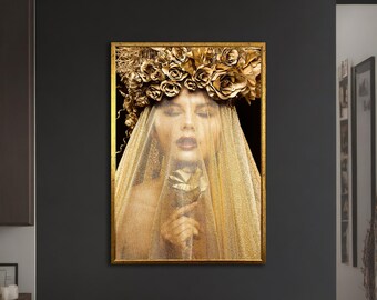 May include: A woman with a golden veil and a crown of golden roses holds a single golden rose in front of her face.