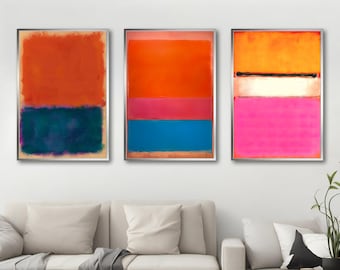 May include: Three abstract paintings in silver frames with colorful horizontal stripes. The paintings are in shades of orange, pink, white, blue, and teal.