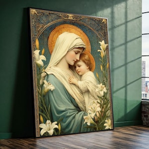 May include: A framed religious print depicting a woman in a blue robe and white head covering, holding a child. The artwork is framed by white lilies and a gold halo. The background features a blue and gold design.