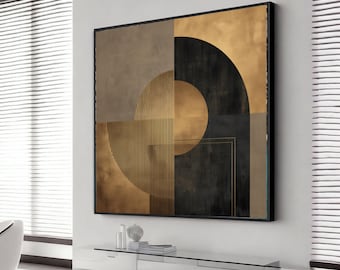 May include: Abstract geometric wall art in a black frame. The artwork features a combination of shapes, including circles, semi-circles, and vertical lines, in shades of gold, brown, and black. The piece is mounted on a white wall.