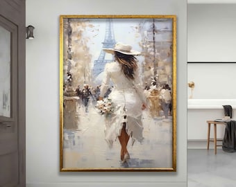 Canvas painting of woman in white dress walking in front of the eiffel tower