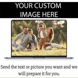 May include: A laptop computer screen displaying a photo of a family of four in a grassy field. The family is smiling and looking at the camera. The text "YOUR CUSTOM IMAGE HERE" is displayed above the photo.
