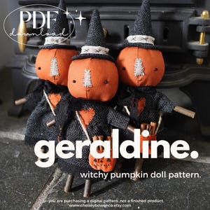 May include: Three handmade witchy pumpkin dolls. Each doll has an orange pumpkin head, black hat, and black outfit with an orange heart. The dolls are holding small orange pumpkin bags. The text "geraldine. witchy pumpkin doll pattern" is visible.
