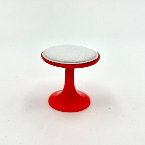Brio red foot stool with white “leather” fabric