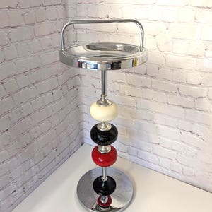 Beautiful Mid Century modern standing ashtray made in 50&#39;s  Decorated with 3 colored balls. Near mint condition exept for red ball flaking.