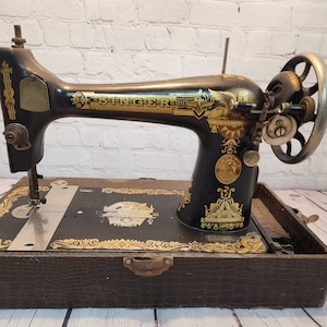Antique singer sewing machine, 1904, model 28, sphinx design - stunning colors antique sphinx singer  sewing machine