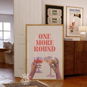 Peut inclure: Une affiche rose et blanche avec le texte "ONE MORE ROUND" en lettres roses. Deux mains tiennent des verres de vin, l'un rouge et l'autre blanc.