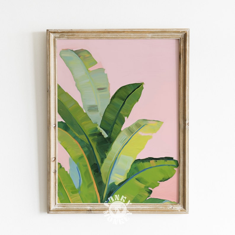 May include: A framed painting of a tropical banana leaf plant with green leaves against a light pink background.