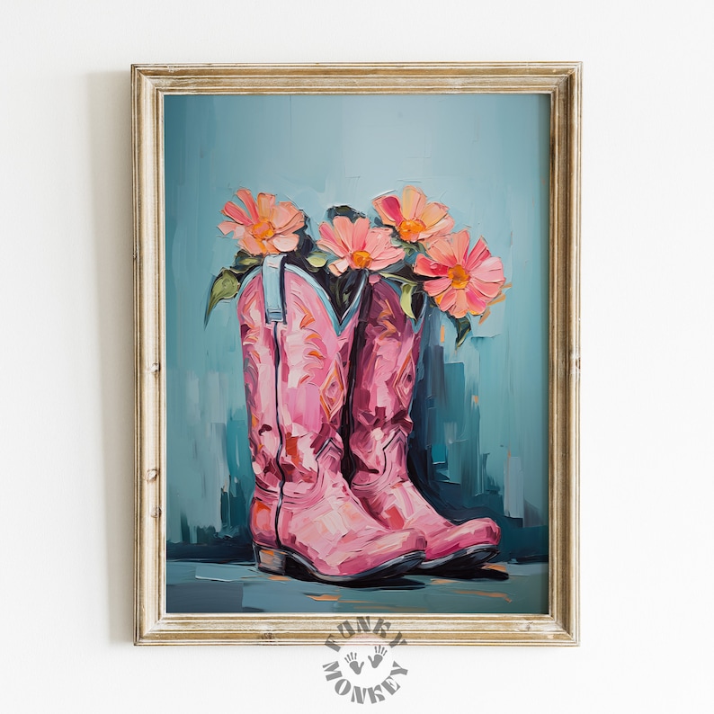 May include: A pair of pink cowboy boots with a bouquet of pink flowers in the top. The boots are painted in a stylized way with a blue background.