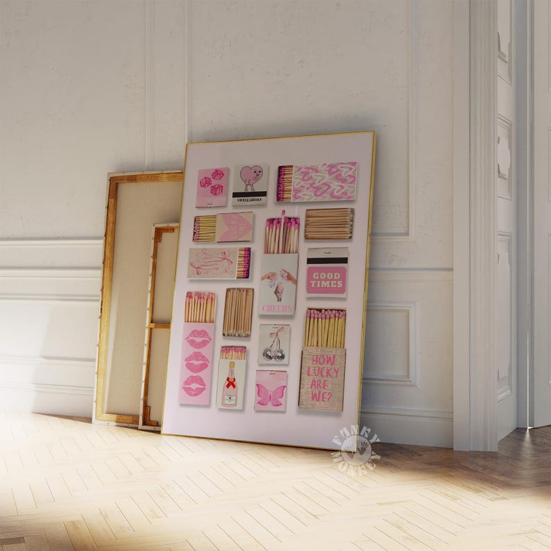 May include: A pink and white collage of matchboxes with various designs and text, including "Good Times", "How Lucky Are We?" and "I Just Do Me".