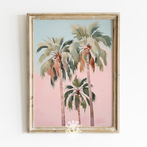 May include: A framed painting of three palm trees against a pink and blue sky. The palm trees are painted in a stylized, abstract style with green and brown hues.