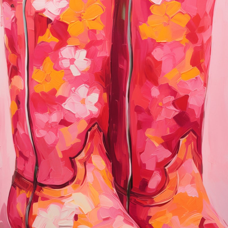 May include: A pair of pink cowboy boots with a floral pattern. The boots have a pointed toe and a high heel.