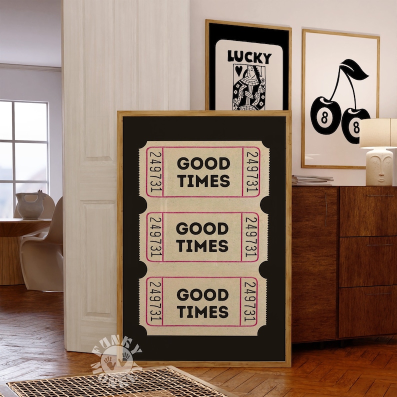 May include: Three brown paper tickets with the text "GOOD TIMES" printed in black on each ticket. The tickets are on a black background and have the number "249731" printed on each side.