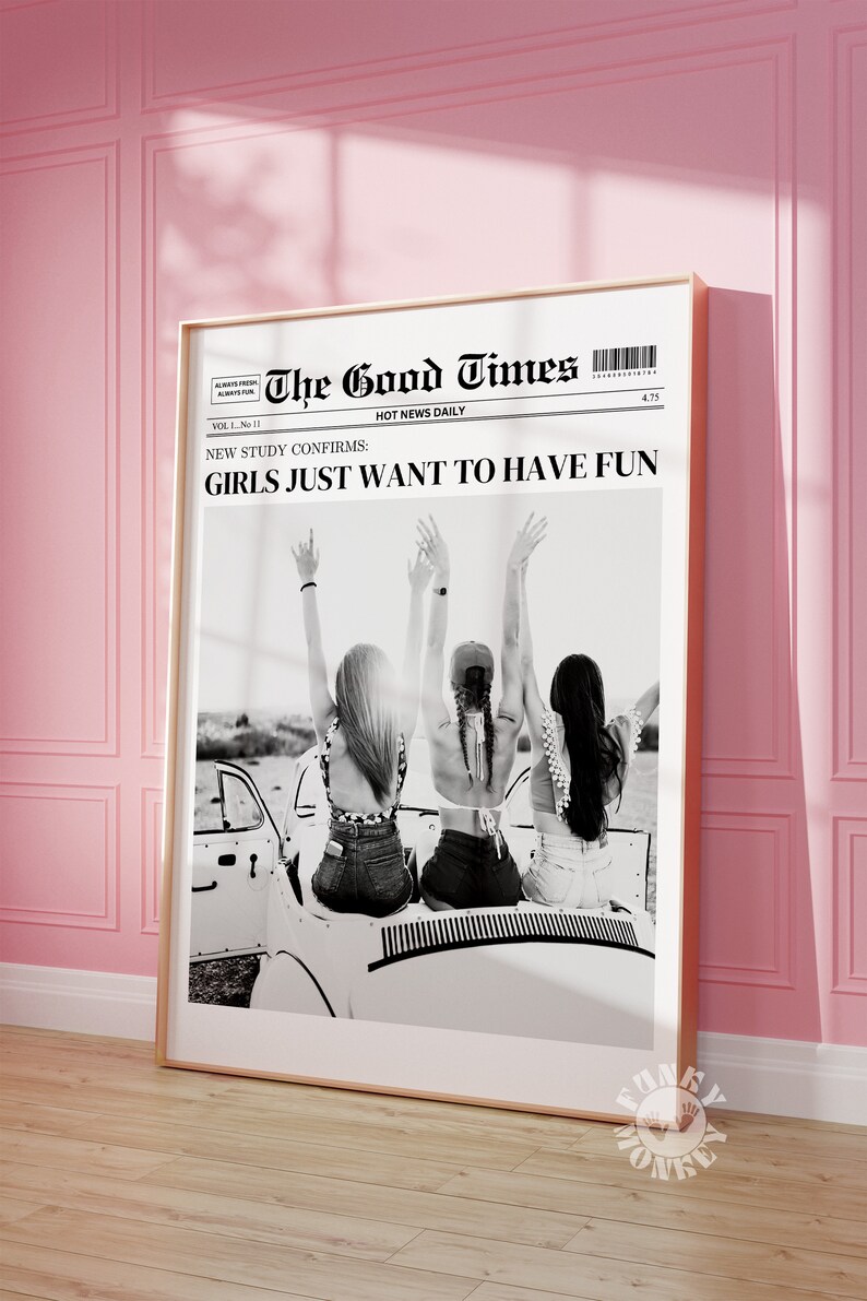 May include: Black and white photo of three women in a convertible car with their arms raised in the air. The photo is printed on a newspaper with the headline "The Good Times" and the text "NEW STUDY CONFIRMS: GIRLS JUST WANT TO HAVE FUN".
