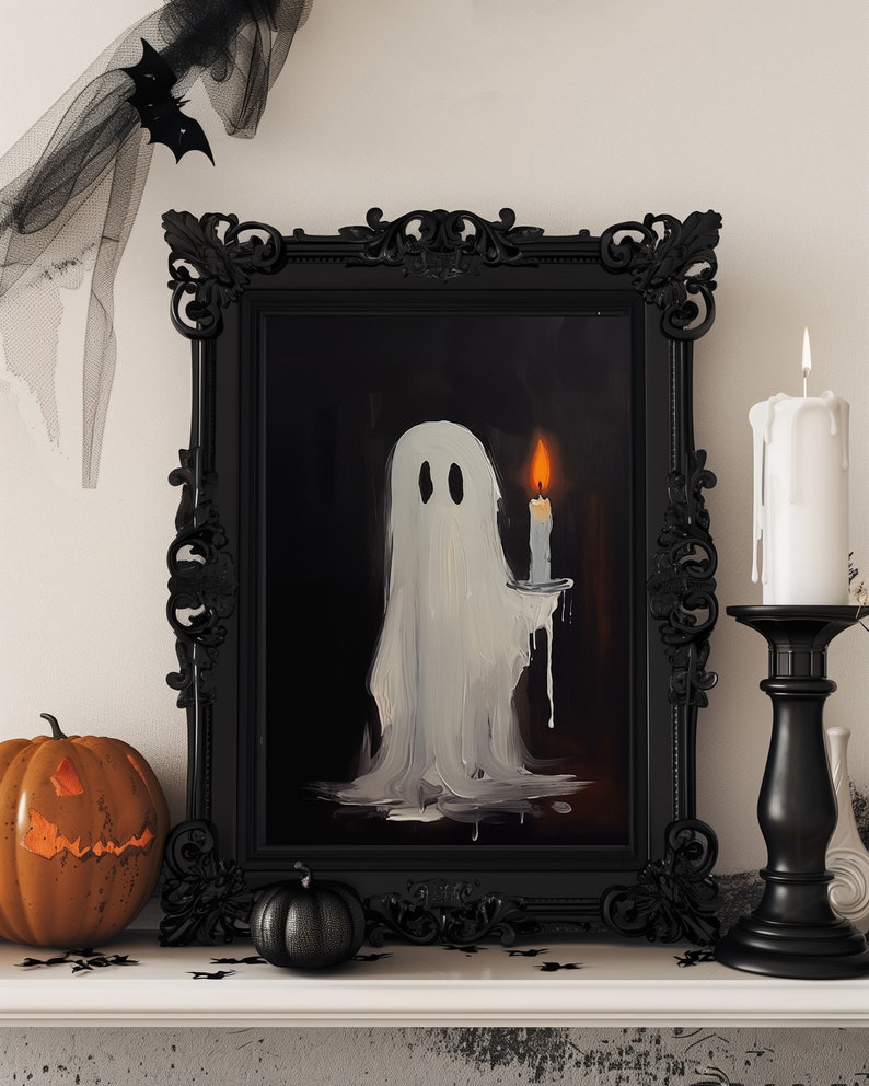 May include: A black framed painting of a white ghost holding a lit candle against a dark background.