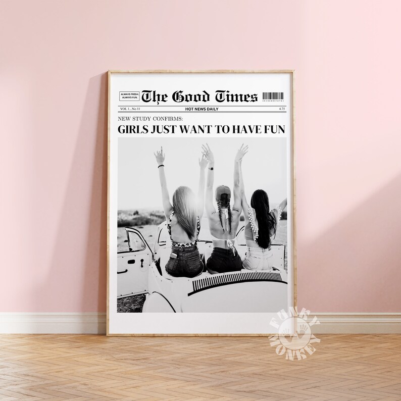 May include: Black and white photo of three friends in a convertible car with their arms raised in the air. The photo is printed on a newspaper with the headline "The Good Times" and the text "NEW STUDY CONFIRMS: GIRLS JUST WANT TO HAVE FUN".