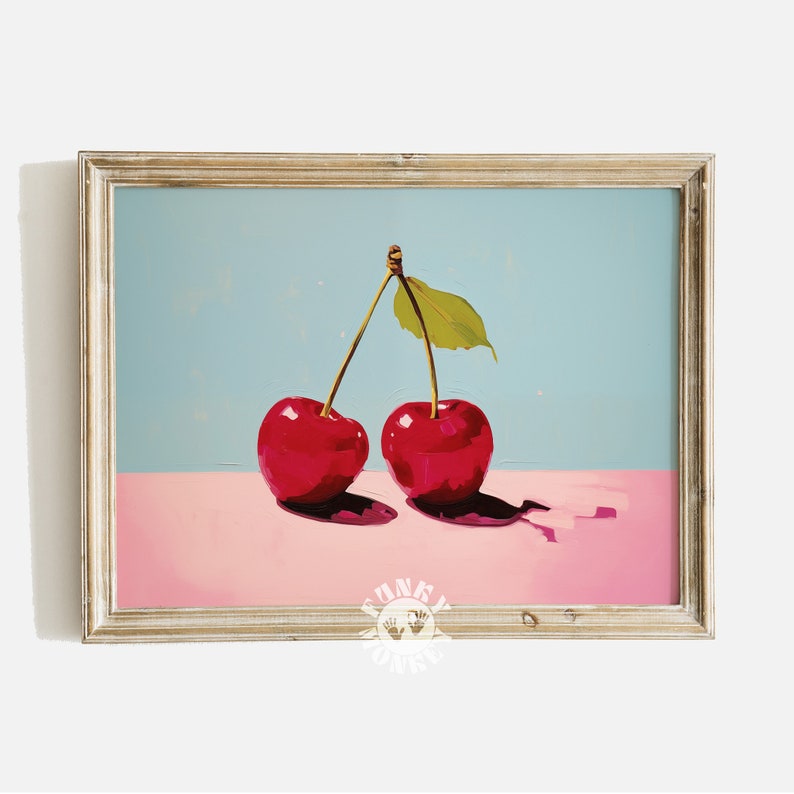 May include: Two red cherries with green stems and leaves on a light blue background with a pink surface underneath.