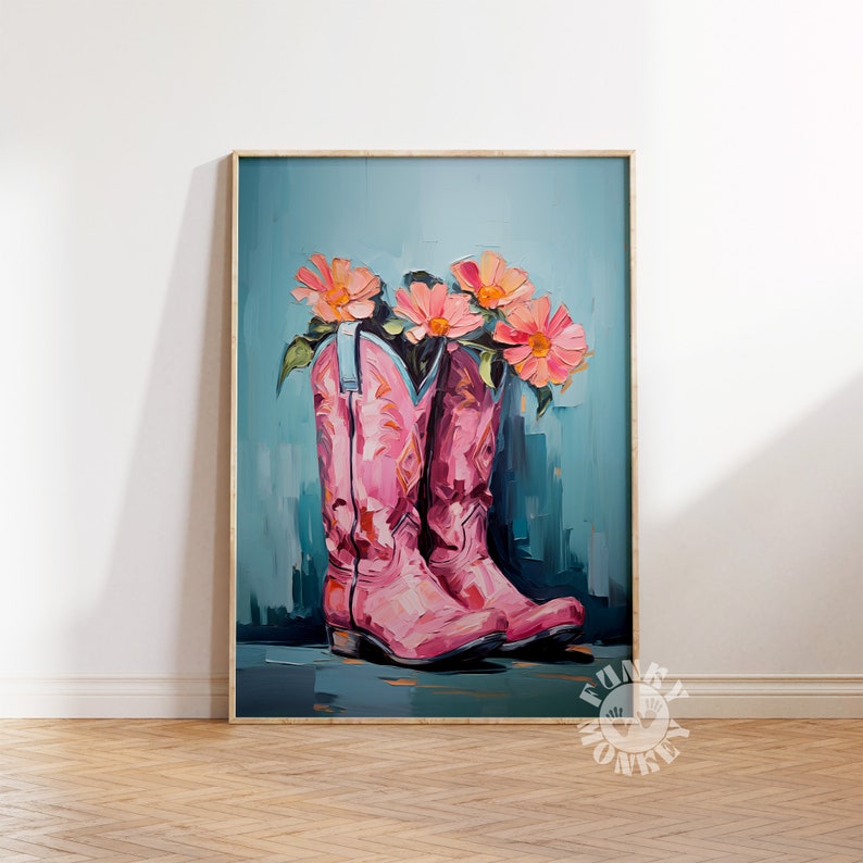 May include: A painting of two pink cowboy boots with pink flowers in the tops of the boots. The boots are on a blue background.