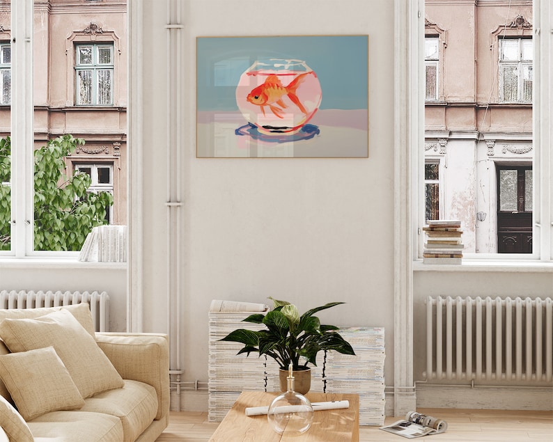 May include: A painting of a goldfish in a glass bowl. The bowl is on a table with a light blue background. The goldfish is orange and white.
