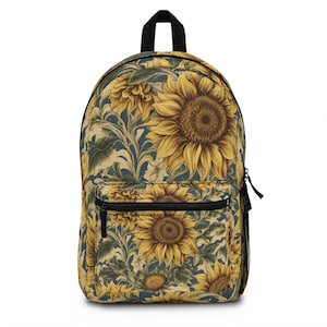 May include: A sunflower-patterned backpack with a blue background. The sunflowers are yellow with brown centers and green leaves. The backpack has a black zipper and a black adjustable strap.